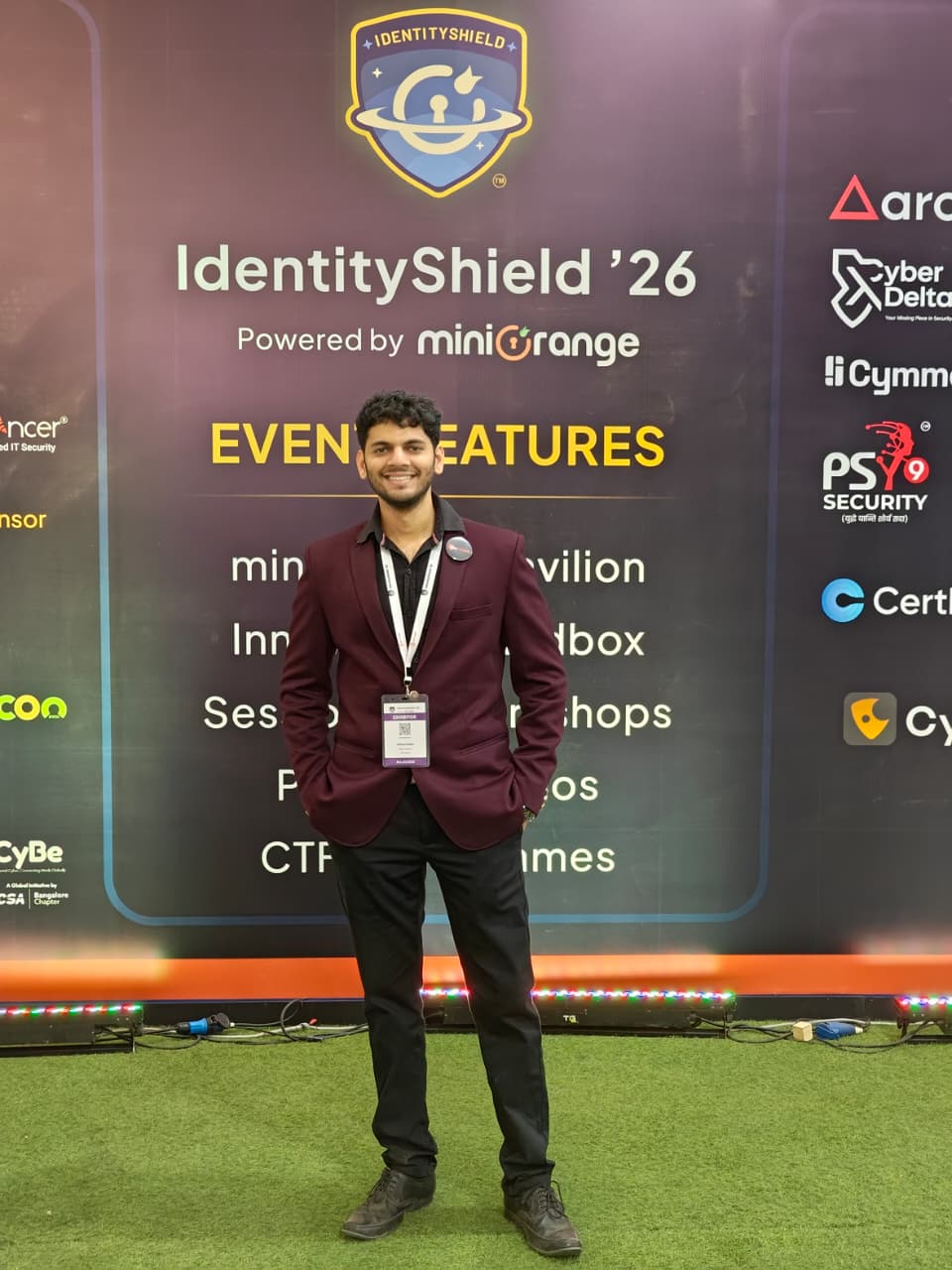 SecComply team member at the event features board